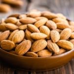 almonds-in-a-bowl-on-wooden-table-max